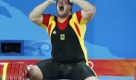 Matthias Steiner schreit seine Freude ber Gold heraus: Ich kann's nicht erklren. Wahnsinn, einfach Wahnsinn. Foto: dpa