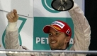 Mit erstklassiger Taktik auf Rang zwei:Nick Heidfeld freut sich in Sepang ber seinen Podiumsplatz. Foto: dpa