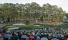 From left, the group of Tiger Woods, Stewart Cink and Jeev Milkha Singh of India walk to the 16th green during the first round of the Masters golf tournament at the Augusta National Golf Club in Augusta, Ga., Thursday, April 9, 2009. (AP Photo/Rob Carr) Foto: ap