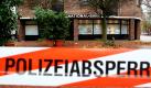 Vor einer Filiale der National-Bank hat die Polizei ein Absperrband in Gladbeck gespannt. Ein oder mehrere Täter hatten die Bank am Morgen überfallen und eine Bombe bei sich gehabt. Foto: dpa
