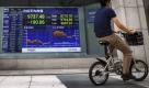 Der japanische Aktienindex Nikkei sank in den ersten Stunden um 198,09 Punkte auf einen Stand von 9730,25 Punkten. Dieser Rückgang wird auf regionale Wirtschaftsschwankungen zurückgeführt. Foto: ap