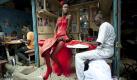 In this photo provided on Friday Feb. 10, 2012 by World Press Photo, the 2nd prize Arts and Entertainment Singles category of the 2012 World Press Photo contest by Vincent Boisot, France, Riva Press for Le Figaro Magazine, shows a model posing in front of tailor stalls in the center of Dakar, Senegal, July 9, 2011. She wears the creation of a designer, Yolande Mancini, participating in the 9th edition of Dakar Fashion Week. (Foto:Vincent Boisot/Riva press for Le Figaro Magazine/AP/dapd) Foto: dapd