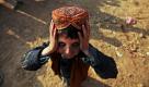 Ein afghanischer Flüchtlingsjunge rückt im pakistanischen Rawalpindi seinen Hut zurecht. Foto: ap
