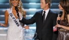 Hosts Billy Bush, center, and Nadine Velazquez, right, listen as Miss California Carrie Prejean, 
left answers a question from judge Perez Hilton, unseen, about legalizing same-sex marriage during 
the Miss USA Pageant, Sunday April 19, 2009 in Las Vegas. We live in a land where you can choose 
same-sex marriage or opposite marriage, Prejean said. And you know what, I think in my country, 
in my family, I think that I believe that a marriage should be between a man and a woman. No offense 
to anybody out there, but that's how I was raised. Foto: ap