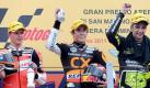 Sieger Marc Marquez (M) feiert nach dem Großen Preis von San Marino mit Stefan Bradl (l) und Andrea Iannone auf dem Podium.  Foto: dpa