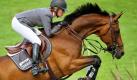 Die deutsche Reiterin Meredith Michaels-Beerbaum springt mit ihrem Pferd Shutterfly in Aachen während des Reitturniers CHIO über ein Hindernis.  Foto: dpa