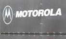 Der traditionsreiche Handyhersteller Motorola Mobility tit sich schwer. Foto: dpa Foto: dpa