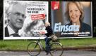 CDU-Ministerpraesident Juergen Ruettgers, links, und seine SPD Herausforderin Hannelore Kraft, rechts, sind am Donnerstag, 8. April 2010, in Duesseldorf, Nordrhein-Westfalen, auf Wahlplakaten ihrer Parteien zu sehen. Die Parteien eroeffnen am Wochenende die heisse Wahlkampfphase fuer die Landtagswahl in NRW am 9. Mai 2010. (apn Photo/ Roberto Pfeil) --- Northrhine-Westfalian state governor Juergen Ruettgers of the Christian Democrats, CDU, on left, and the Social Democratic Party, SPD, top candidate Hannelore Kraft, on right, are seen on their parties' election campaign posters in Duesseldorf, Germany, on Thursday, April 8, 2010. Residents in the German state of North Rhine-Westphalia are called to vote a new regional parliament on May 9, 2010. (apn Photo/Roberto Pfeil) Foto: ap