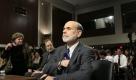 Federal Reserve Chairman Ben Bernanke takes his seat before he testifies before the Senate Committee on Banking, Housing, and Urban Affairs on Capitol Hill in Washington Wednesday, July 21, 2010. (AP Photo/Alex Brandon) Foto: ap