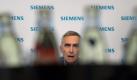 Räumt Fehler ein und korrigiert den geplanten Jahresgewinn drastisch nach unten: Siemens-Vorstandsvorsitzende Peter Löscher. Foto: Peter Kneffel/Archiv Foto: dpa