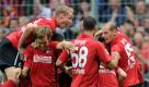 Grund zum Jubeln gab es auch beim SC Freiburg: Jan Rosenthal, hier in der Jubeltraube versteckt, erzielte gegen den 1. FC Köln zwei Tore... Foto: dpa