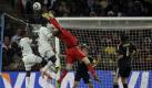 Germany goalkeeper Manuel Neuer, center, makes a save during the World Cup group D soccer match between Ghana and Germany at Soccer City in Johannesburg, South Africa, Wednesday, June 23, 2010. (AP Photo/Ivan Sekretarev) Foto: ap