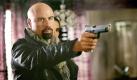 John Travolta hat offenbar seine beste Film-Zeit hinter sich. Im französichen Actionthriller From Paris with Love von 2010 spielte er den glatzköpfigen und mit Ketten behängten Proll-Agenten Charlie Wax. Für ihn sicher ein Spaß, für die Zuschauer indes ganz und gar nicht. Foto: dapd