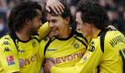 Dortmunds Neven Subotic (M) feiert seinen Treffer zum 1:0 gegen Hannover mit den Mannschaftskollegen Patrick Owomoyela (l.) und Mats Hummels. Foto: dpa