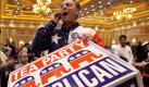 Dudley Winn, of Lubbock, Texas, talks on a cell phone during an election night party for Republican Senate candidate Sharron Angle Tuesday, Nov. 2, 2010, in Las Vegas. (AP Photo/Julie Jacobson) Foto: dapd