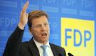 FDP-Chef Guido Westerwelle spricht am Mittwoch (25.02.2009) beim 'Politischen Aschermittwoch' der FDP in Passau (Niederbayern) zu seinen Parteifreunden. In Niederbayern treffen sich traditionsgemäß die Parteien mit ihren Anhängern zu wortstarken Reden. Foto: Armin Weigel dpa/lby +++(c) dpa - Bildfunk+++
 Foto: dpa