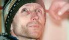 Anatoli Onoprienko, a 39-year-old confessed serial killer, sits in the dock during court session in Gytomir, 130 km from Kiev, Monday 23 November, during hearing of his case, which began amid much media-interest today. Anatoliy Onoprienko, the world's worst known serial killer, has taken the lives of at least 52 people, among them 9 hildren. The majority of Ukrainians demand the death penalty for the killer, but the government declared a death penalty moratorium following pressure from European community. Foto: dpa