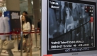 Wrmescanner: Am Flughafen in Bangkok/Thailand sollen mit dem so genannten Thermal Screening kranke Passagiere erkannt werden. Foto: dpa