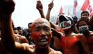 Indonesische Aktivisten mit bemalten Körpern protestieren in Jakarta, Indonesien, gegen die Korruption im Staat. Foto: dpa