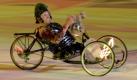 Krieger auf Rädern: Ein Rollstuhlfahrer nimmt an der Eröffnungsfeier der X. Winter-Paralympics in Vancouver teil. Bis zum 21. März kämpfen 506 seh- und körperbehinderte Sportler um die Medaillen. Foto: ap