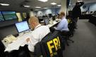 Agents from the FBI and other law enforcement agencies work at a 24-hour operations in a coordinated investigation of the Times Square attempted bombing, Monday May 3, 2010. There have been at least nine planned terror attacks here since Sept. 11, 2001. Those involved hoped variously to destroy the Brooklyn Bridge, to blow up financial institutions, to smuggle explosive materials into the city, to detonate explosives on the subway, to release cyanide into the subway system, to ignite an airport jet-fuel pipeline, and to collapse Path train tunnels at ground zero. (AP Photo/ Louis Lanzano) Foto: ap