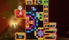 Auf den ersten Blick mag diese Variante von Tetris nach dem Standardspiel in Farbe aussehen. Wer genauer hinsieht, dem fallen die besonderen Quader auf: Das sind Bomben, die sich durch gefüllte Reihen zünden lassen und so dabei helfen, das gesamte Spielfeld auf einmal abzuräumen. Foto: Nintendo
