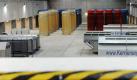 Behälter mit hoch radioaktiven Abfällen (hinten) und einige Transporthauben im atomaren Zwischenlager in Gorleben. Foto: Julian Stratenschulte  Foto: dpa