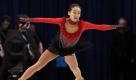 Momentaufnahme: Mao Asada hebt bei ihrer atemberaubenden Kür ab. Die Japanerin holt Silber. Foto: ap