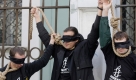 Aktivisten von Amnesty International demonstrieren vor der weißrussischen Botschaft in Moskau. Foto: AP
