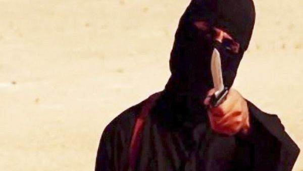 Szene aus einem Video, das von der Terrormiliz Islamischer Staat (IS) am 02.09.2014 veröffentlicht wurde und einen maskierten Mann mit Messer bei der Hinrichtung des US-Journalisten Sotloff zeigen soll. (Foto)