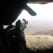 Peschmerga-Kämpfer Mohammed schaut vom Zardk-Berg im Norden des Iraks auf ein Dorf unter Kontrolle der Terrormiliz Islamischer Staat (IS). Iraks Kurden sind im Kampf gegen den IS wichtigster Partner des Westens. Peschmerga-Kämpfer Mohammed schaut vom Zardk-Berg im Norden des Iraks auf ein Dorf unter Kontrolle der Terrormiliz Islamischer Staat (IS). Iraks Kurden sind im Kampf gegen den IS wichtigster Partner des Westens.