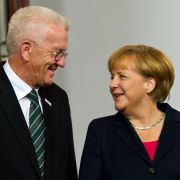 Winfried Kretschmann (Bündnis90/Die Grünen) und Bundeskanzlerin Angela Merkel (CDU) am 03. Oktober 2013 in Stuttgart bei den Feierlichkeiten zum Tag der Deutschen Einheit. Winfried Kretschmann (Bündnis90/Die Grünen) und Bundeskanzlerin Angela Merkel (CDU) am 03. Oktober 2013 in Stuttgart bei den Feierlichkeiten zum Tag der Deutschen Einheit.
