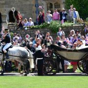 Nach der Trauung fuhren Harry und Meghan mit der Kutsche durch Windsor. Nach der Trauung fuhren Harry und Meghan mit der Kutsche durch Windsor.