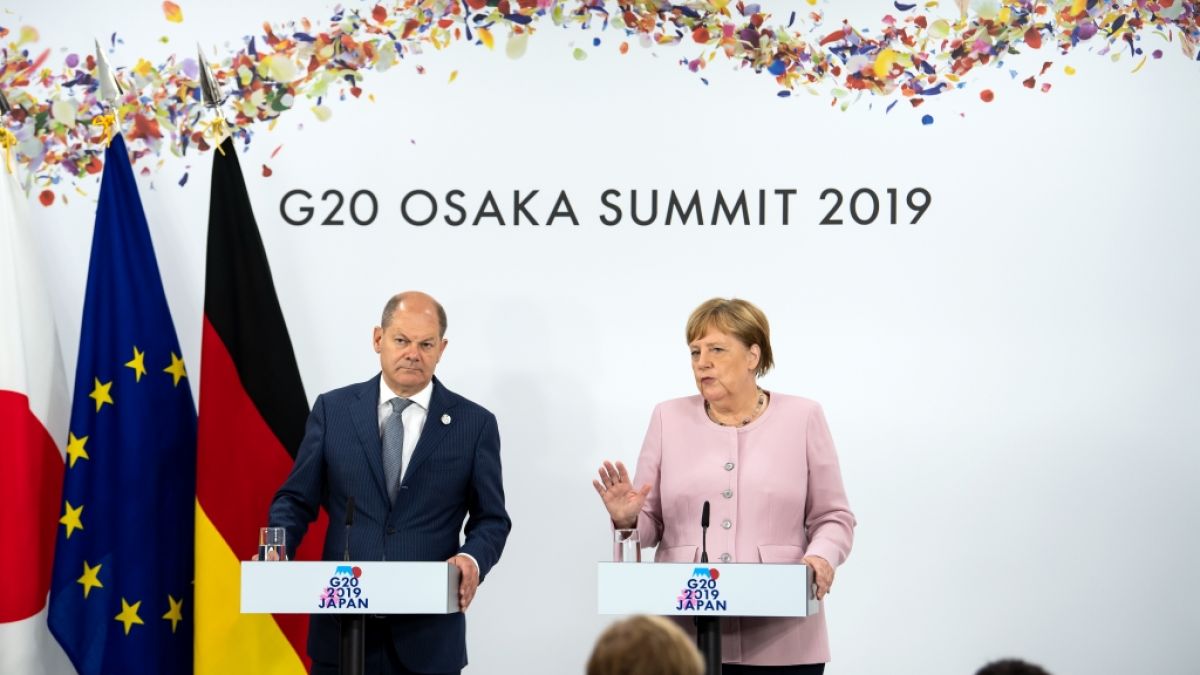 Merkel und Scholz zeigen sich gemeinsam beim G20-Gipfel in Japan. Beim Treffen der Wirtschafts-Mächte sind auch die Finanzminister anwesend. (Foto)