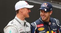 Immer wieder wird Sebastian Vettel (r.) mit Michael Schumacher verglichen.