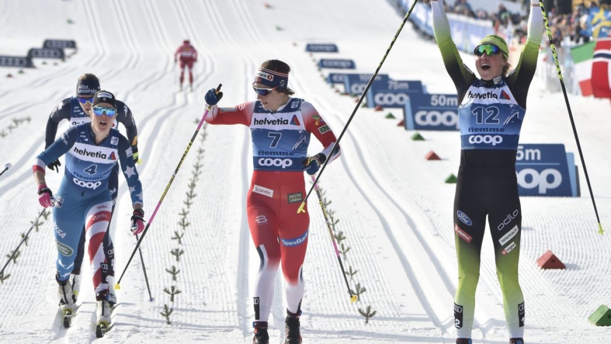 Bei der Tour de Ski 2020 jubelte Anamarija Lampic (r) aus Slowenien im Ziel über den Sieg vor der Zweitplatzierten Astrid Uhrenholdt Jacobsen aus Norwegen (M) und der Viertplatzierten Sadie Maubet Bjornsen aus den USA (l). (Foto)