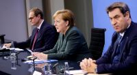 Bundeskanzlerin Angela Merkel (CDU), Berlins Regierender Bürgermeister Michael Müller (l, SPD) und der CSU-Vorsitzende Markus Söder während der Pressekonferenz im Bundeskanzleramt.