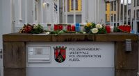 Nach den tödlichen Schüssen auf zwei junge Polizeibeamte in Rheinland-Pfalz gehen die Ermittlungen gegen die beiden Tatverdächtigen weiter.