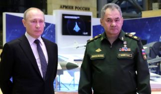 Hat Wladimir Putin (links) eine direkte Drohung an Sergei Schoigu geschickt?