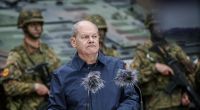Bundeskanzler Olaf Scholz (SPD) gibt beim Besuch der Nato-Übung Quadriga 24 ein Pressestatement.