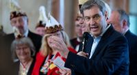 Markus Söder isst an Fasching gern Krapfen - nur grüne Exemplare lässt der CSU-Chef lieber liegen.