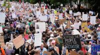 Demonstranten in der USA gehen unter dem Motto 