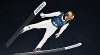 Der deutsche Skispringer Philipp Raimund nimmt bei den Olympischen Winterspielen eine Medaille ins Visier.