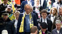 Proteste gegen Friedrich Merz beim Katholikentag – Störer unterbrechen Diskussion