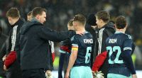 Bundestrainer Julian Nagelsmann (l.) und DFB-Kapitän Joshua Kimmich (Mitte) wollen vor der WM erfolgreiche Testspiele gegen Finnland und die USA bestreiten.