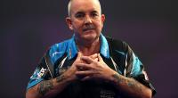 Phil Taylor trägt den Titel 