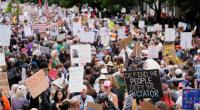 Demonstranten in der USA gehen unter dem Motto 