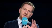 Michael Kretschmer sorgt mit einem neuen Vorschlag zu einer Obergrenze für Geflüchtete für Diskussionen.