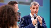 Markus Söder sorgt auf Instagram mit einem GTA-Post sowie einem Selfie aus dem Flugzeug für Wirbel.