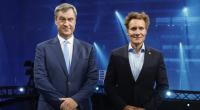 Markus Söder (CSU, l), Ministerpräsident von Bayern, und Ludwig Hartmann (Bündnis 90/Die Grünen), Fraktionsvorsitzender im bayerischen Landtag, nach dem TV-Duell der Sendung 